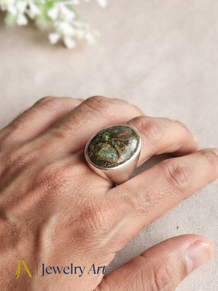 Luxury men's jewelry featuring a handmade natural Copper Chrysocola gemstone ring with silver plated GS finish and premium craftsmanship.
