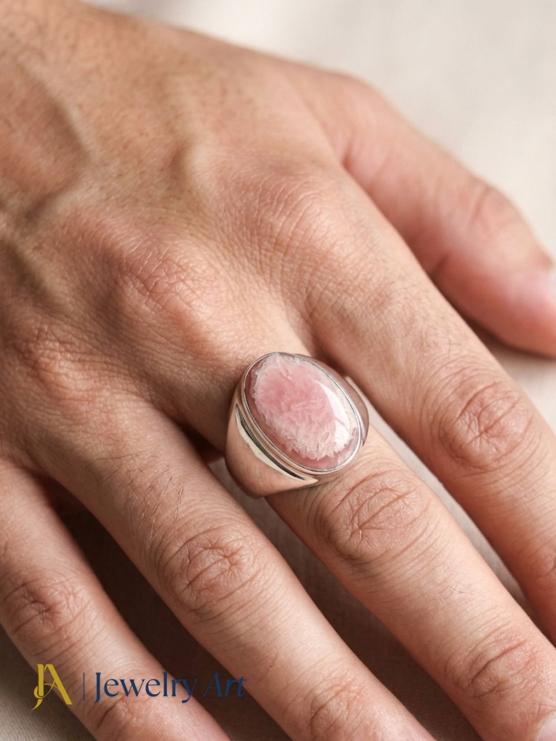 Man wearing Artisan Pink Agate silver plated GS ring
