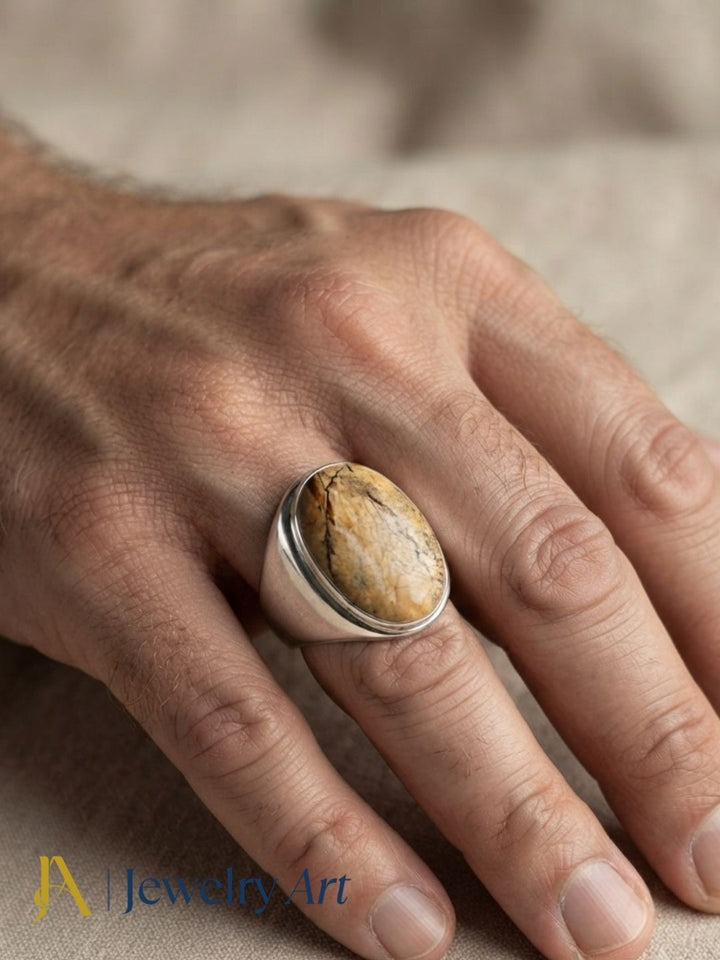 Luxury men's jewelry featuring a handcrafted Picture Jasper gemstone ring with silver plated GS finish and contemporary style.

