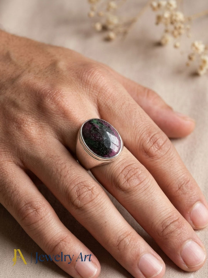 Male model showcasing elegant Ruby Zoisite gemstone ring
