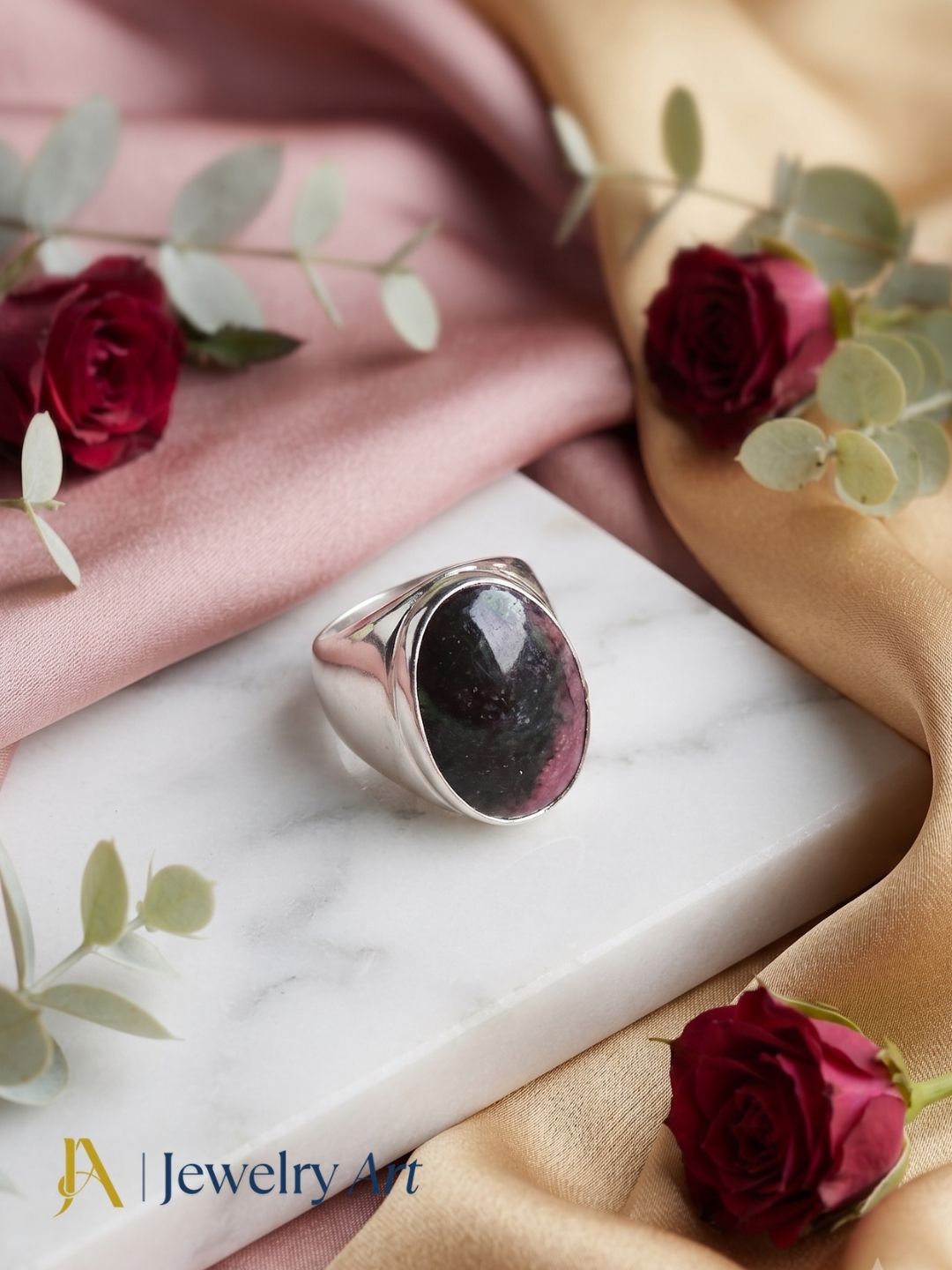 Elegant Ruby Zoisite silver plated ring in premium jewelry display
