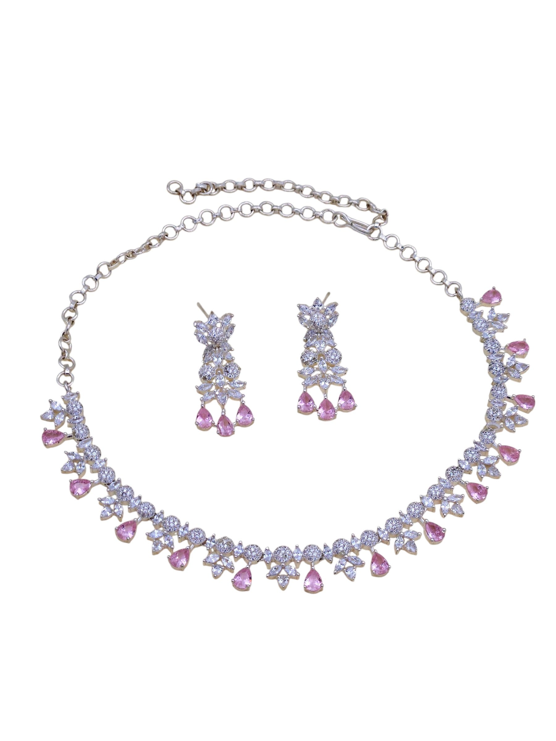 Party-ready rhodium plated necklace and earrings with vibrant pink hydro quartz and dazzling CZ stones
