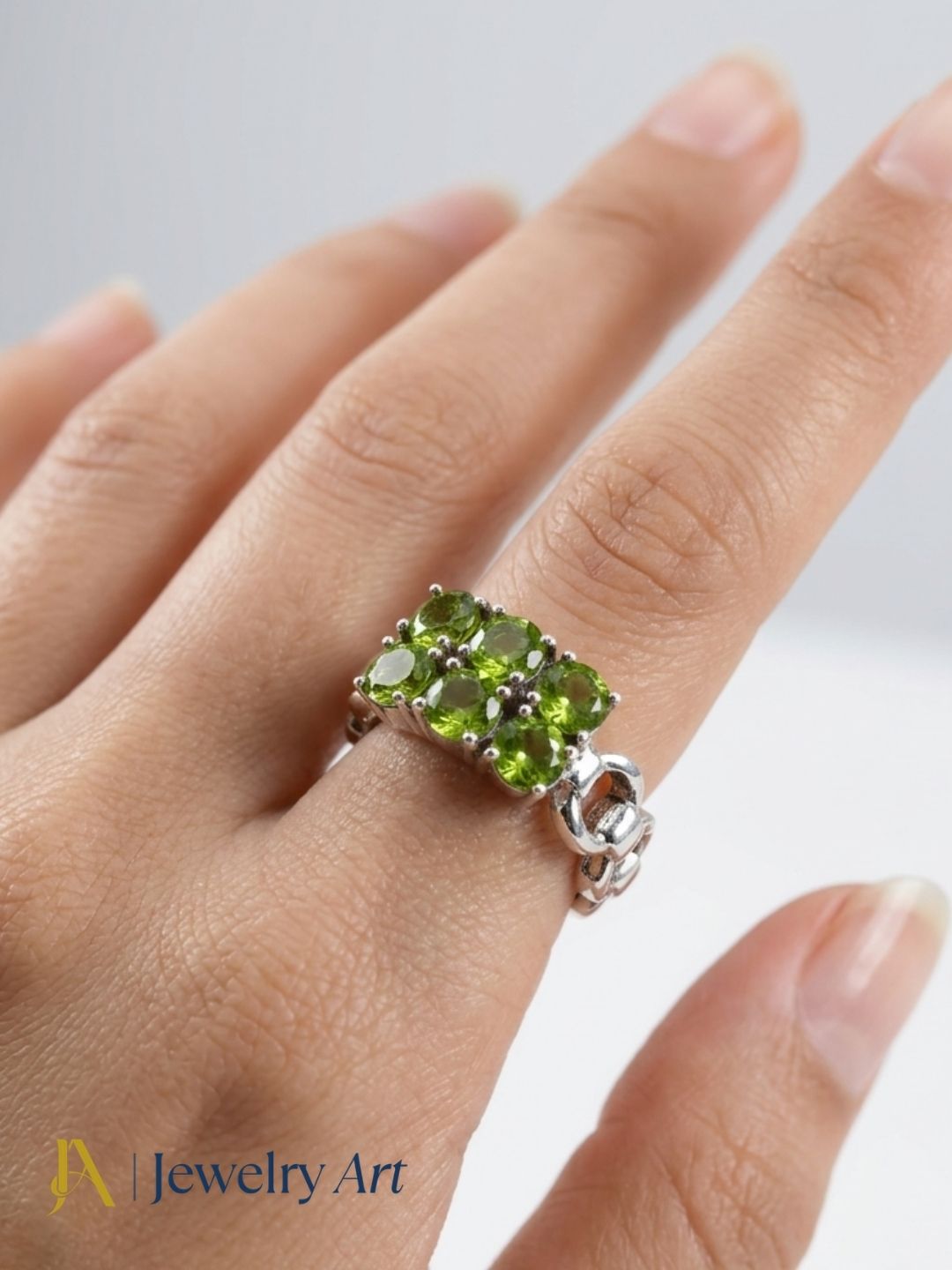 Model showcasing 925 sterling silver Peridot stone finger ring