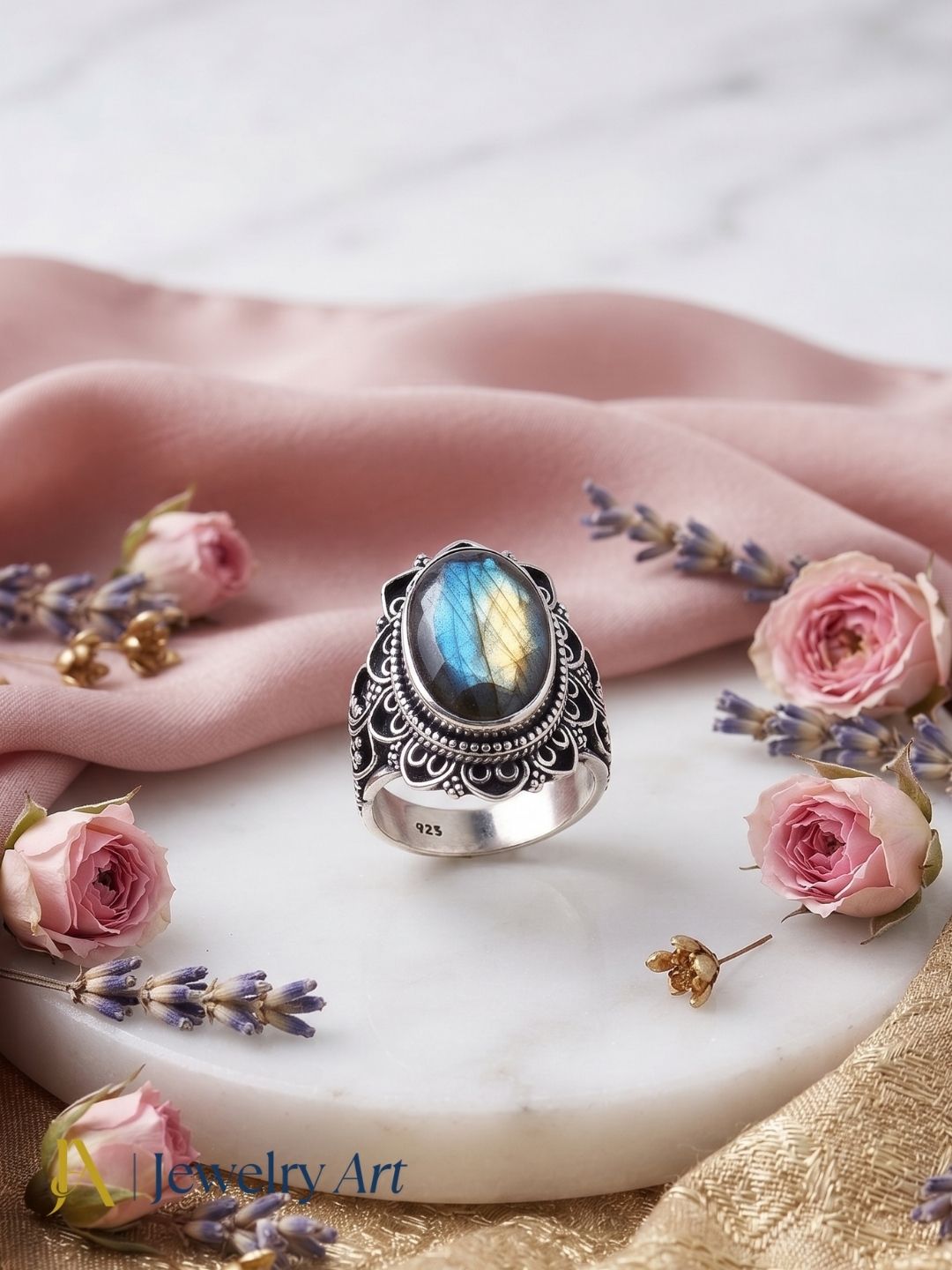 Artistic flat lay of handcrafted 925 oxidized silver Labradorite ring