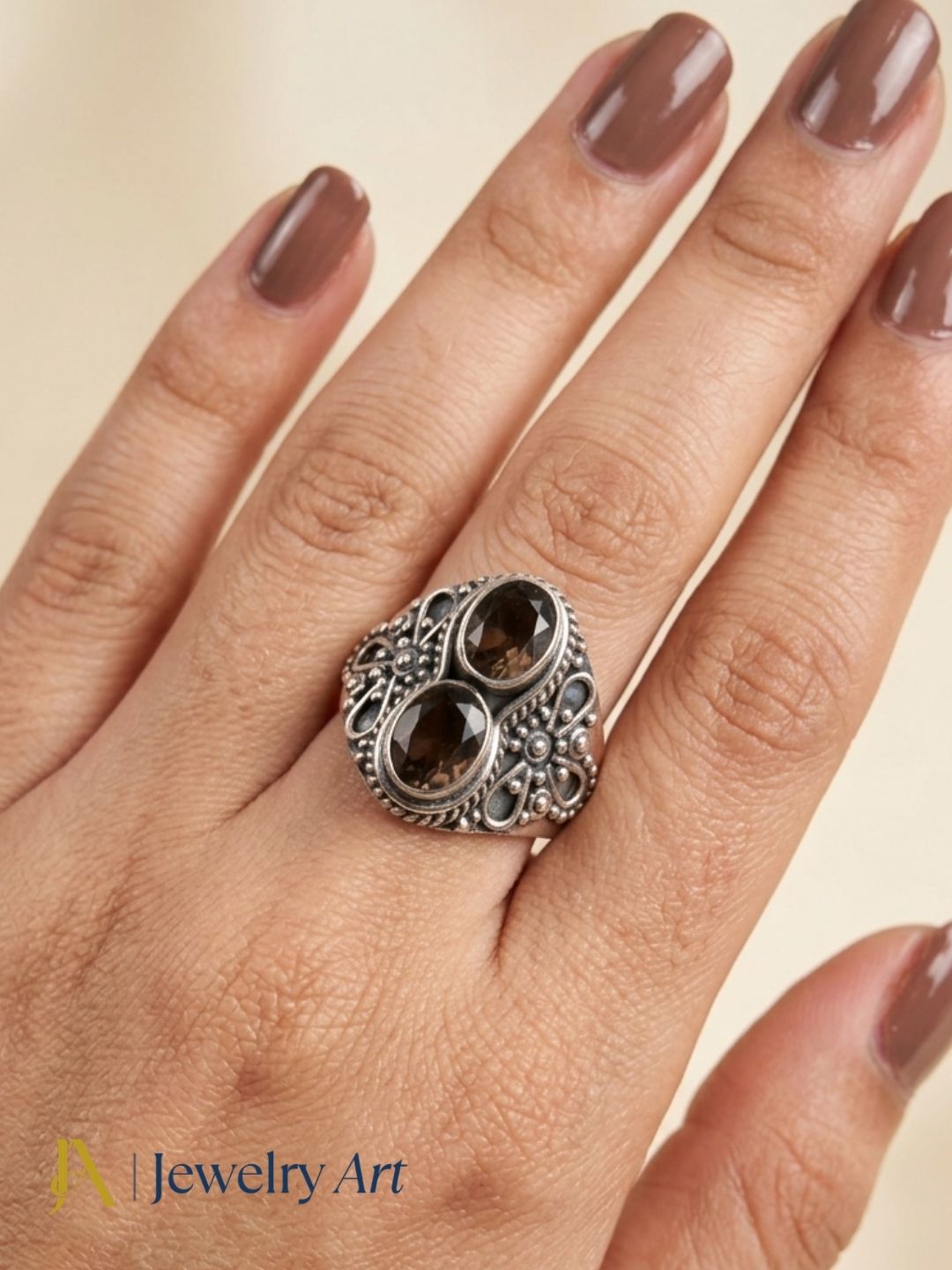 Model wearing artisan 925 oxidized silver Smoky gemstone ring
