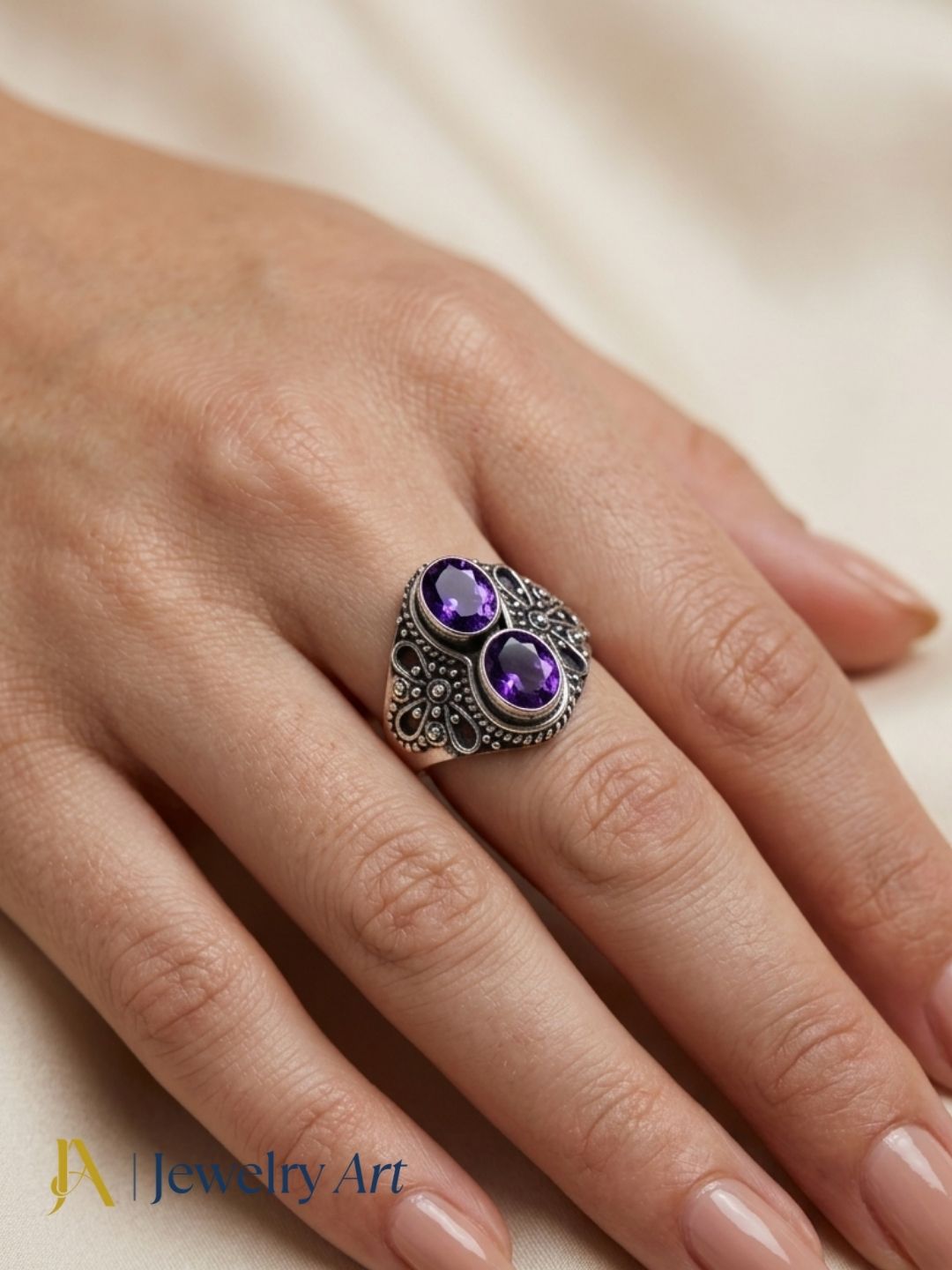 Fashion model wearing elegant 925 silver Amethyst gemstone ring