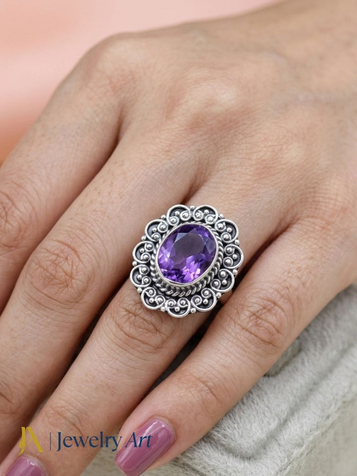 Woman wearing fine handcrafted 925 silver oxidized Amethyst gemstone awesome designer finger ring.