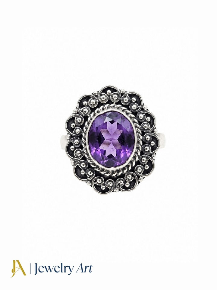 Fine handcrafted 925 silver oxidized Amethyst gemstone awesome designer finger ring isolated on pure white background.
