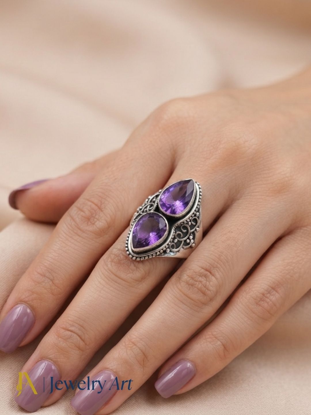 Fashion model wearing elegant 925 silver Amethyst gemstone ring