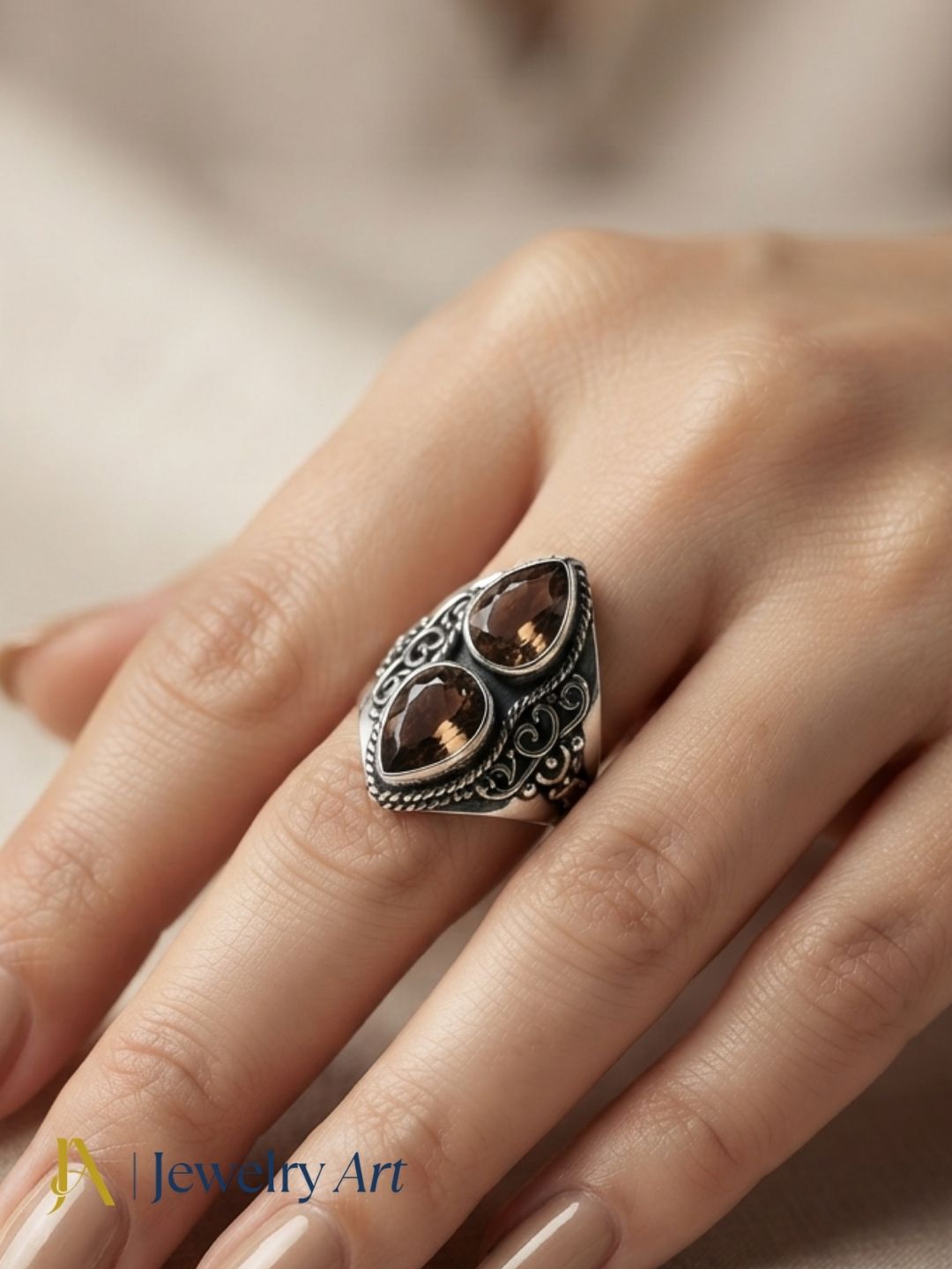 Model wearing artisan 925 oxidized silver Smoky gemstone ring