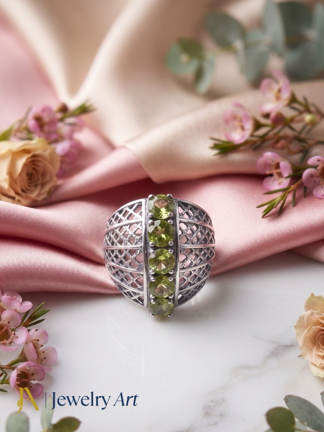 Creative arrangement of handcrafted oxidized silver Peridot gemstone ring
