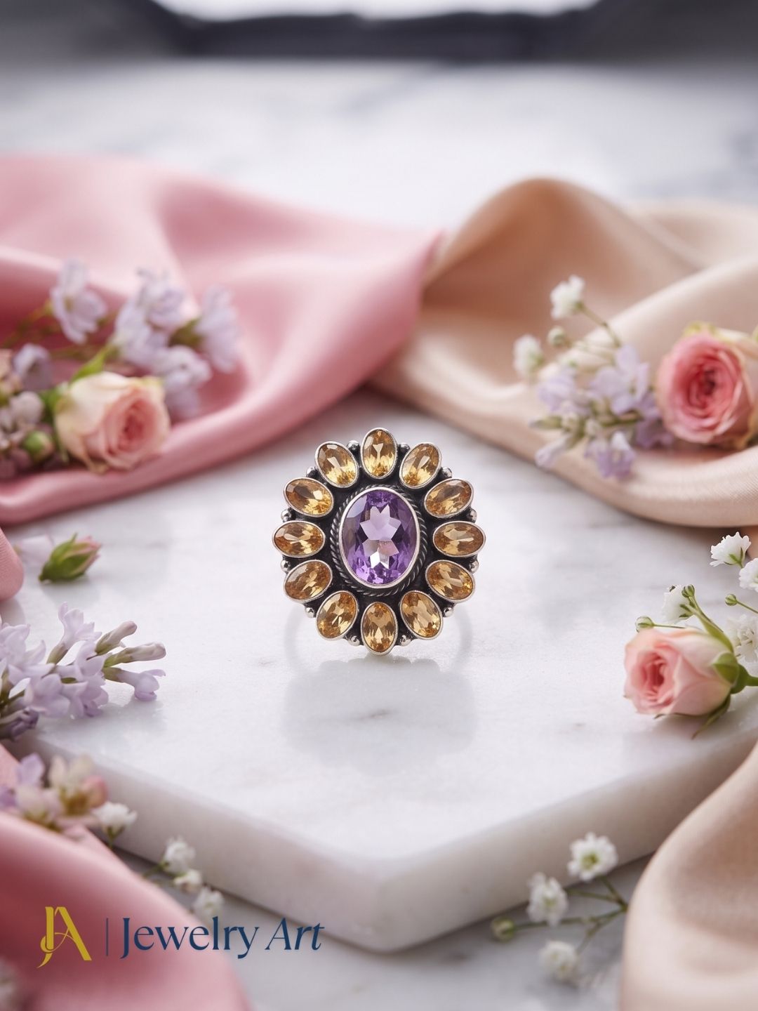 Artistic flat lay of handcrafted 925 silver Citrine Smoky ring