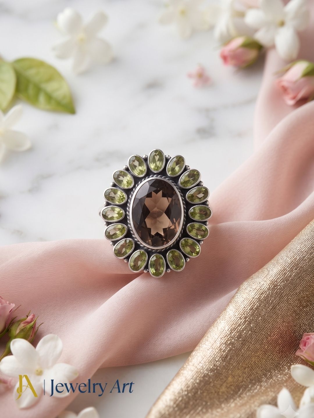 Artistic flat lay of handcrafted 925 silver Peridot Smoky ring