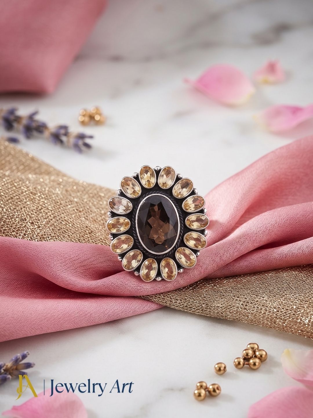 Artistic flat lay of handcrafted 925 silver Citrine Smoky ring